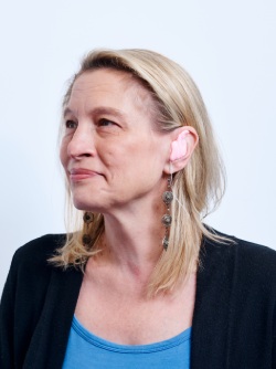 Woman fitting custom hearing protection